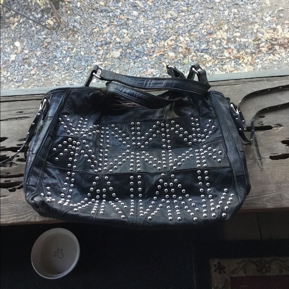 Amen leather hand bag with studs